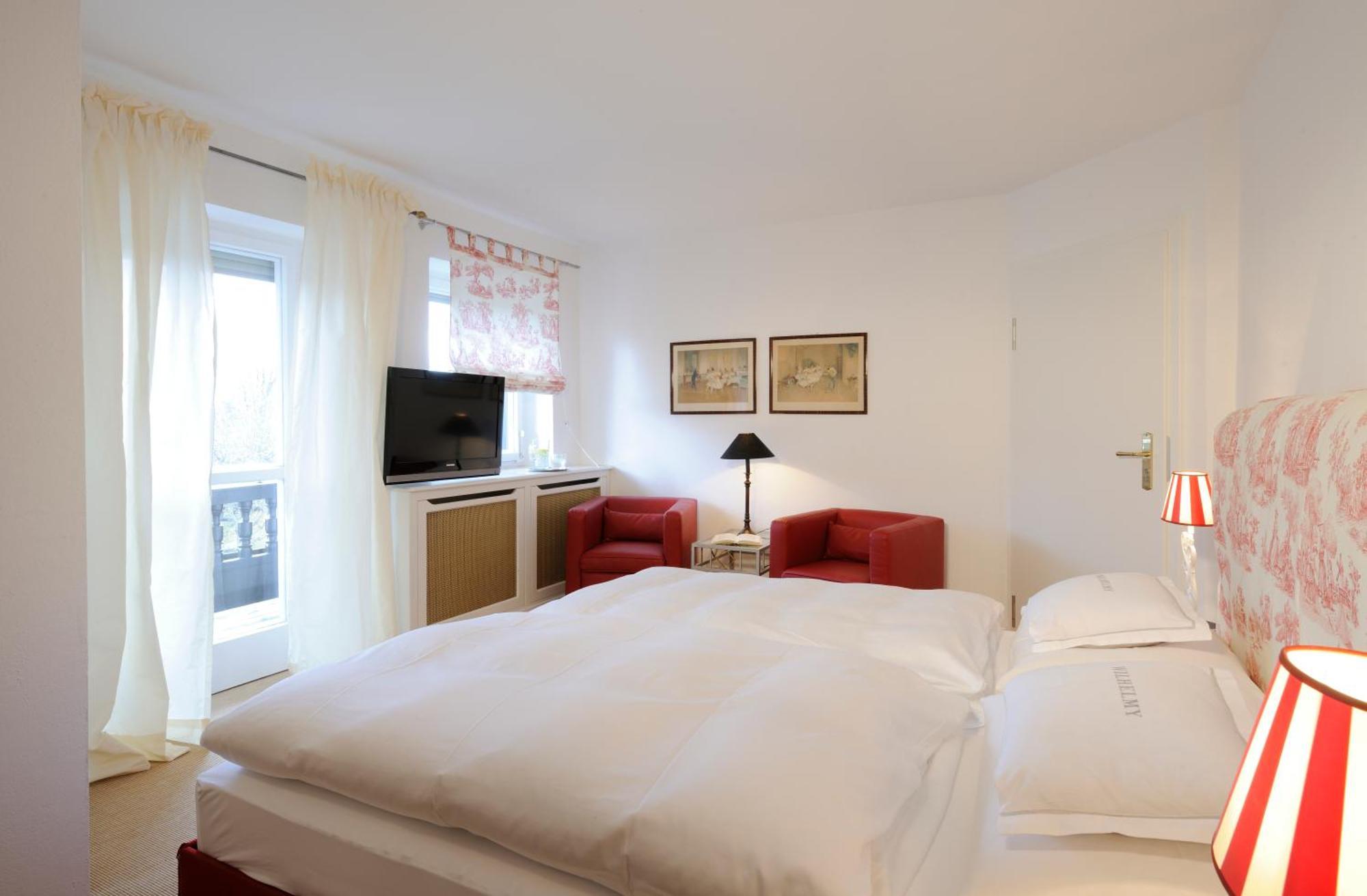 Boutique Hotel Relais Chalet Wilhelmy Bad Wiessee Quarto foto